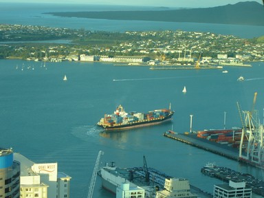 Julia Cotton; Untitled; Ship leaves for the open sea, containers full of goods for far away shores